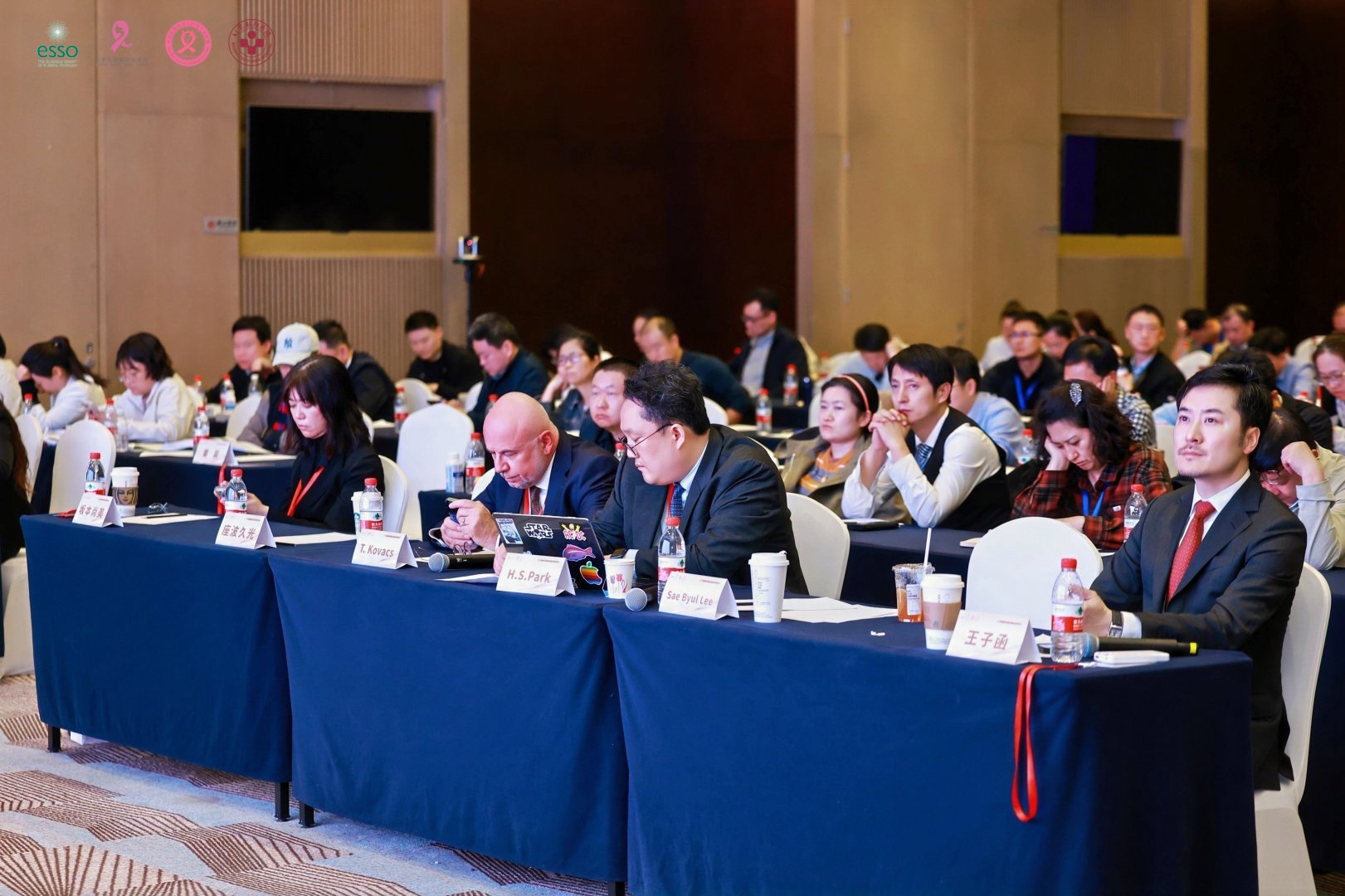 International faculty seated at the front row